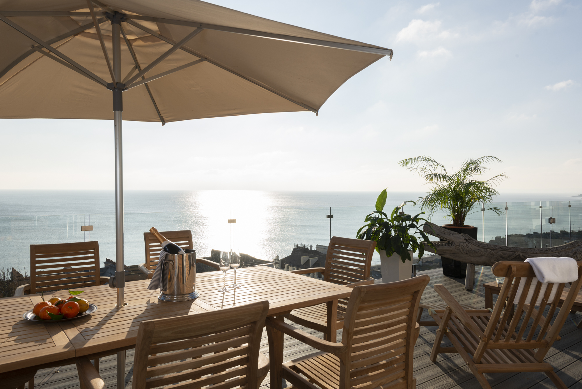 The deck with champagne and sea views