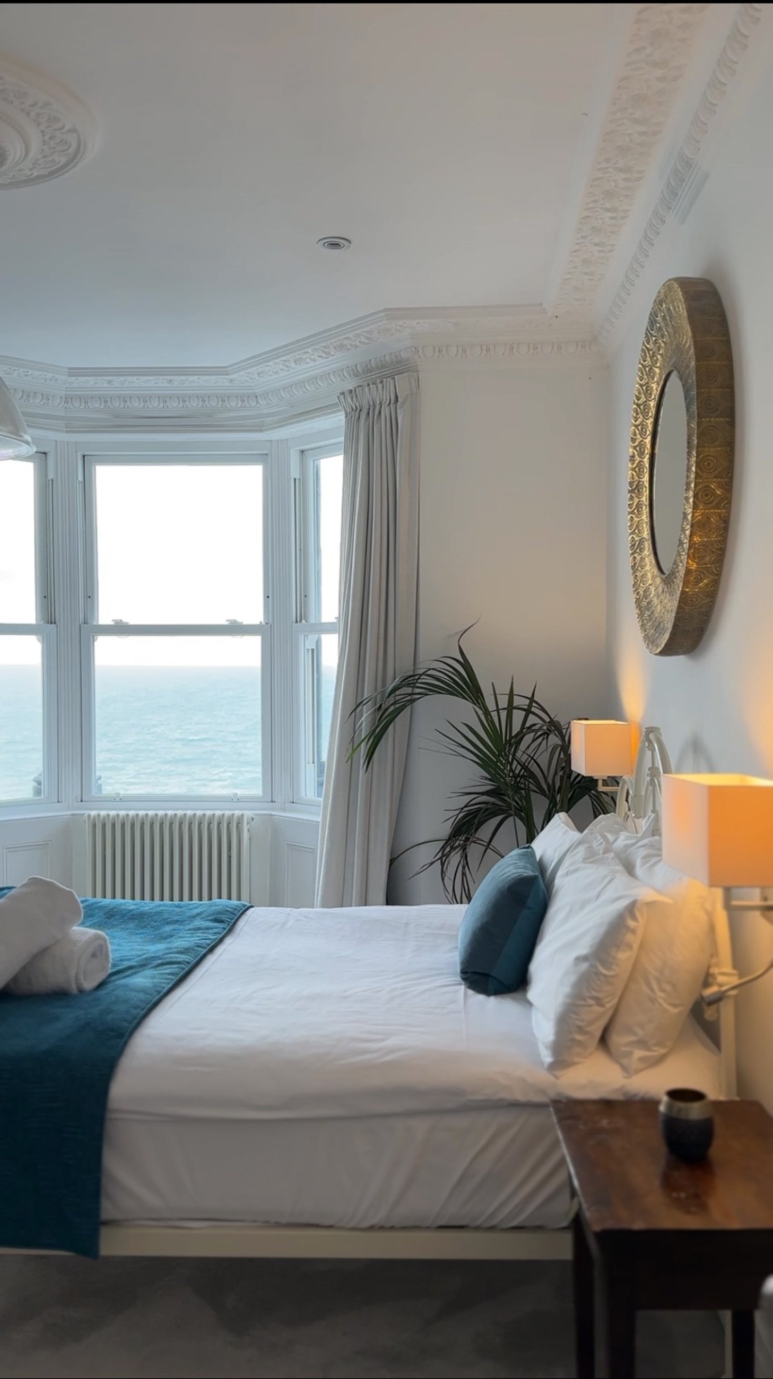 Master Bedroom — king bed with panoramic bay window sea view